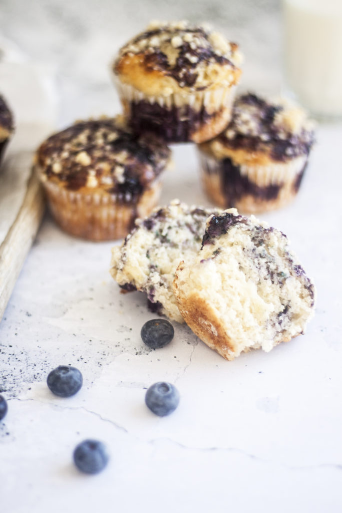 Eggless Blueberry Swirl Yogurt Muffins on white background