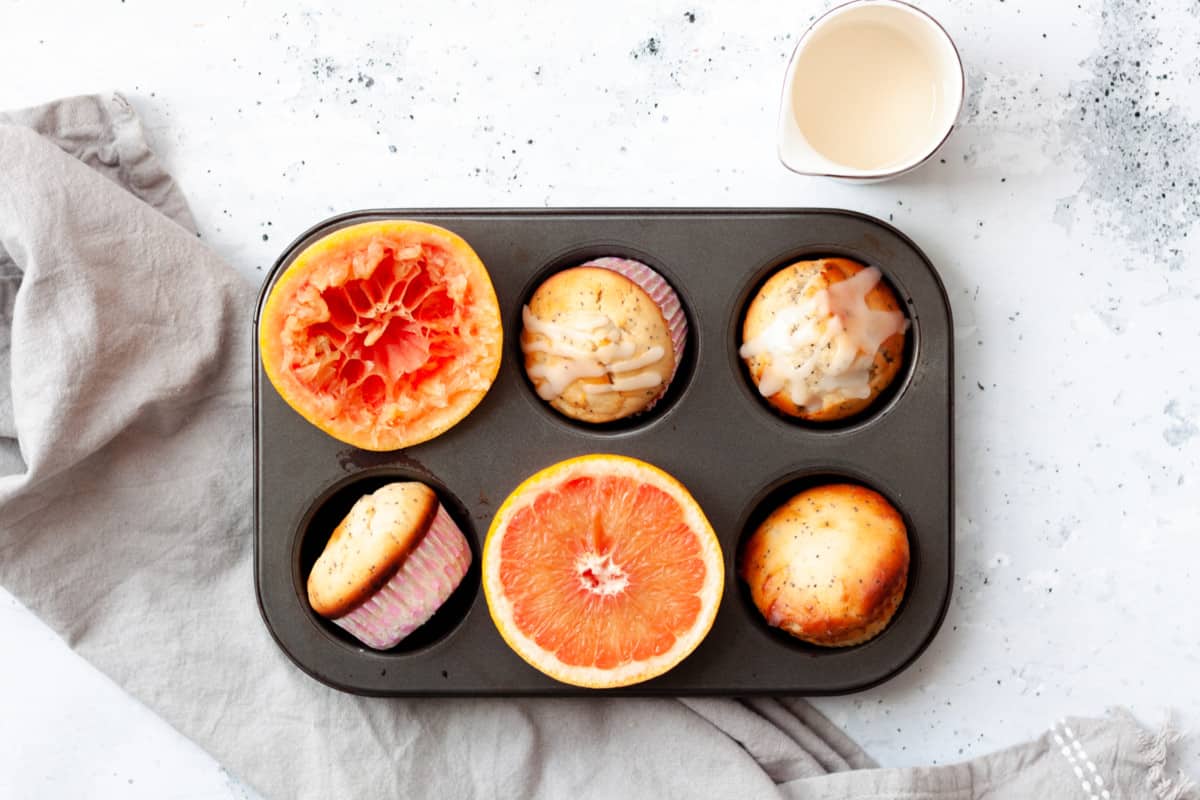grapefruit yogurt muffins in muffin pan
