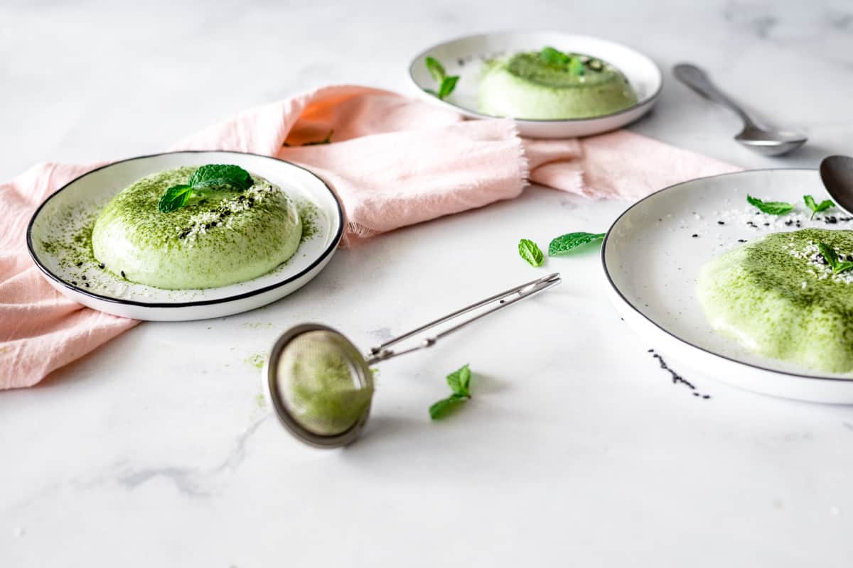 three servings of Matcha Panna Cotta on a white plate