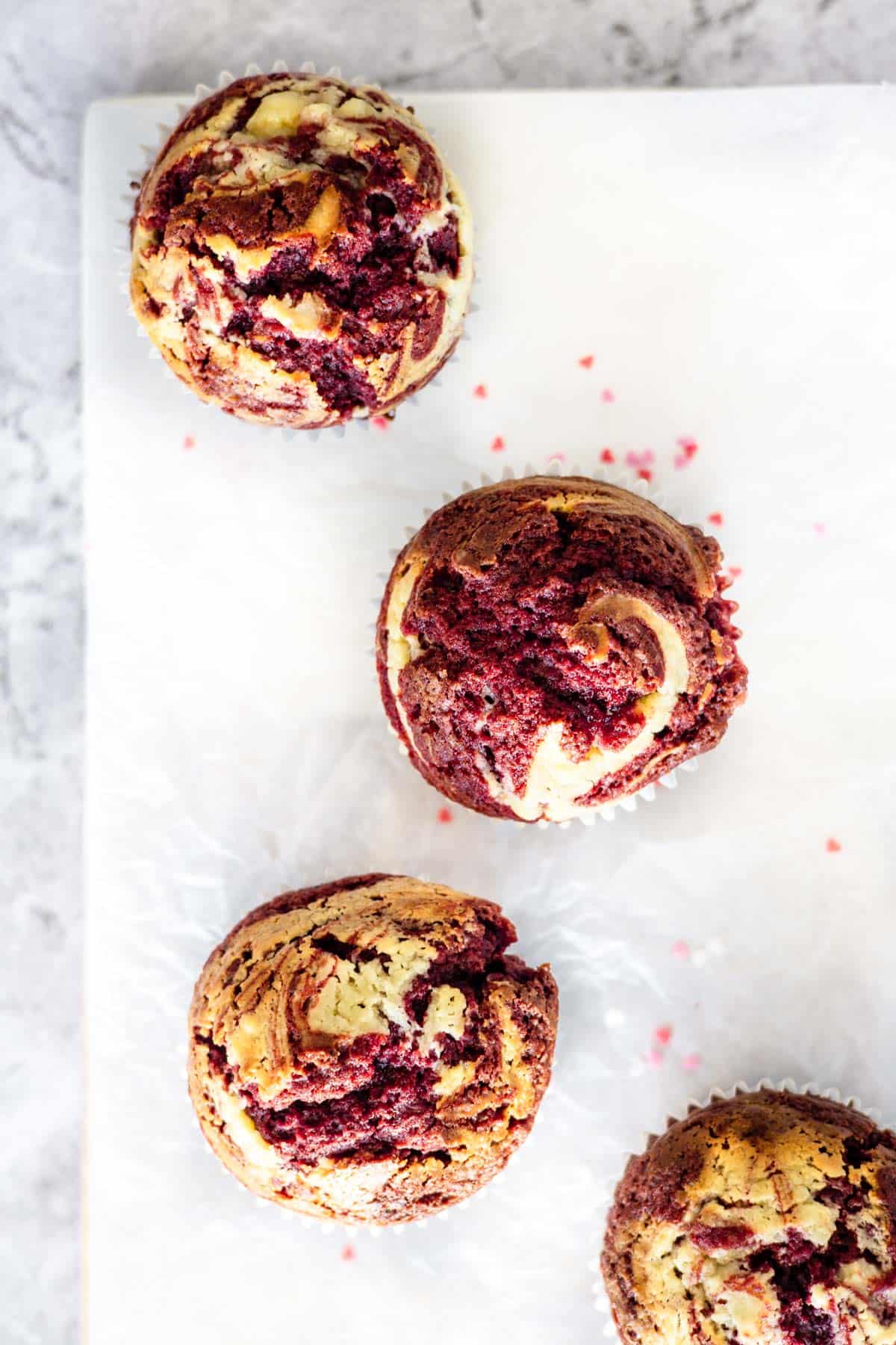Red Velvet Swirl Muffins on a white background