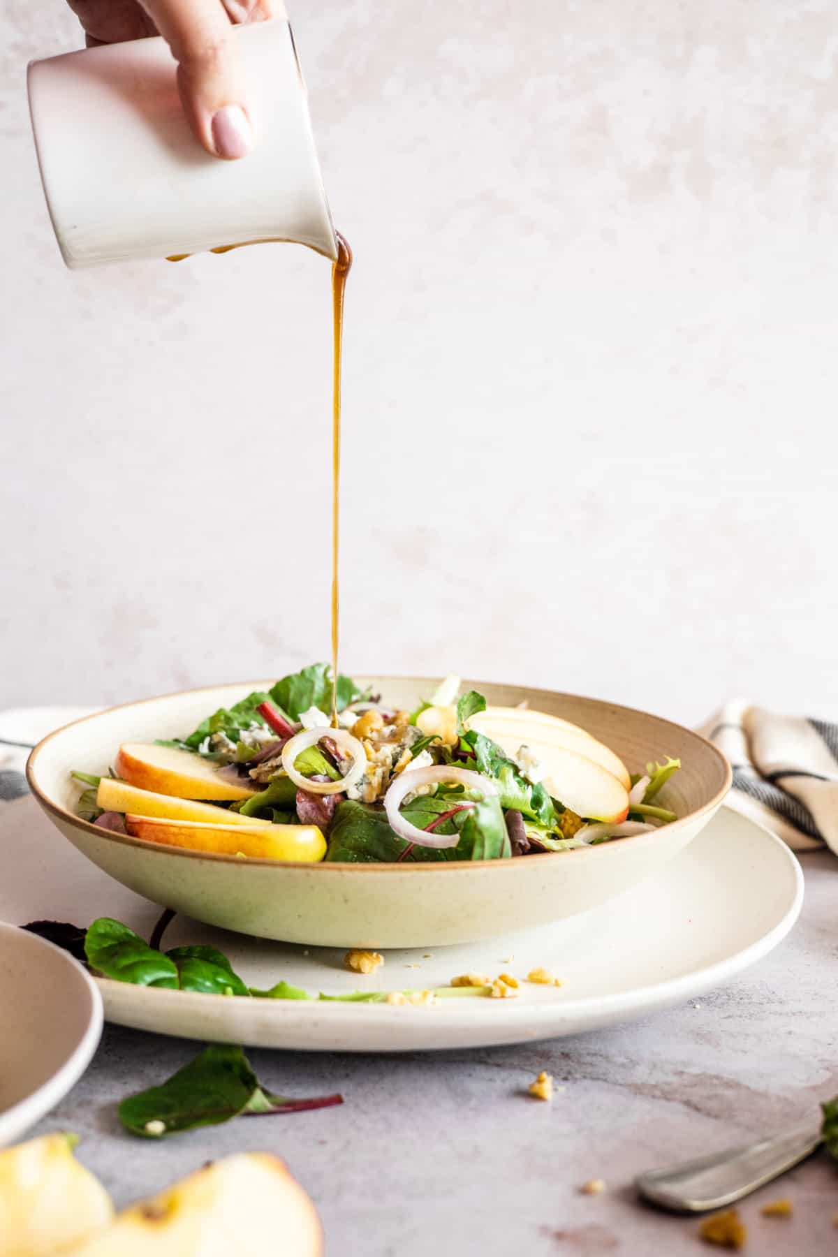 gorgonzola apple salad drizzled with honey balsamic dressing.