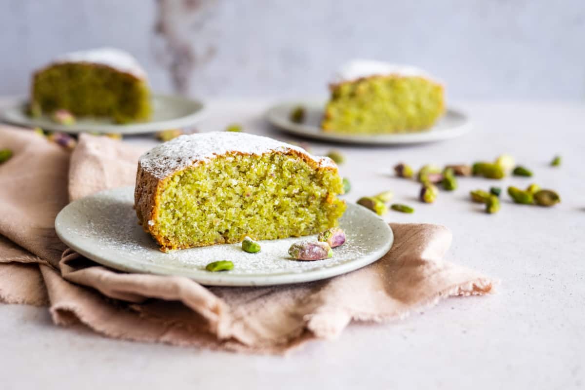 three servings of Italian Pistachio Cake with Cardamom and White Chocolate
