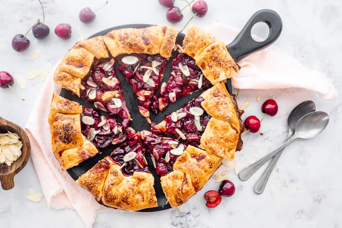 Rustic Cherry Galette on black serving board.
