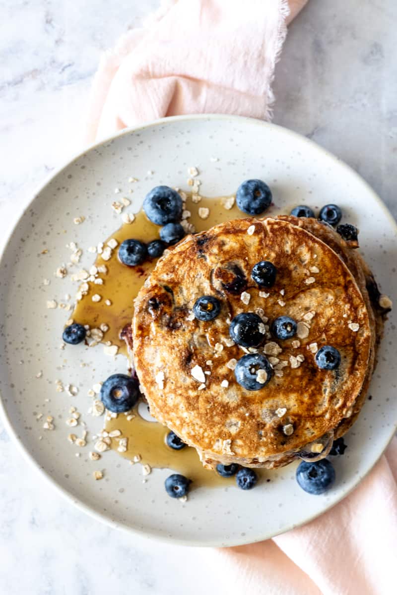 Pancakes with oatmeal and blueberries from above.